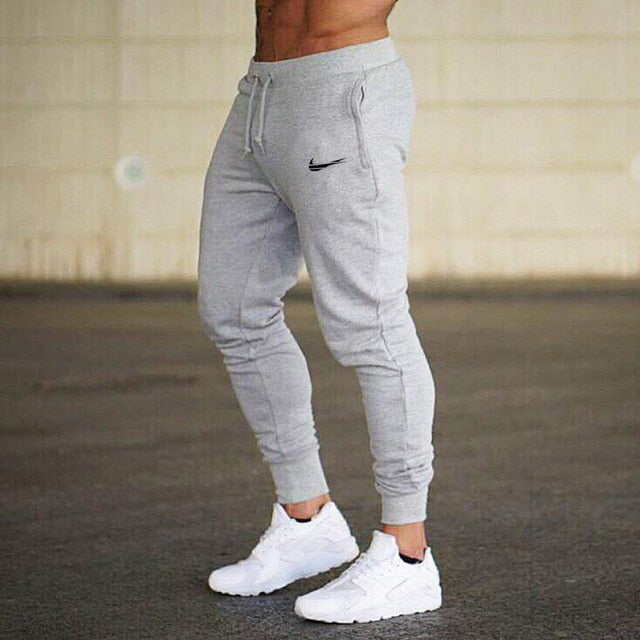 2019 New Men Joggers Brand Male Trousers Casual Pants Sweatpants Men Gym Muscle Cotton Fitness Workout hip hop Elastic Pants