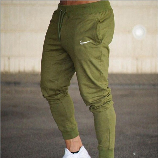 2019 New Men Joggers Brand Male Trousers Casual Pants Sweatpants Men Gym Muscle Cotton Fitness Workout hip hop Elastic Pants